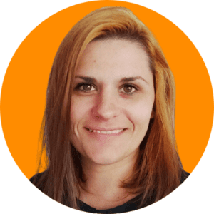 Katerina Crawford headshot, smiling, orange background